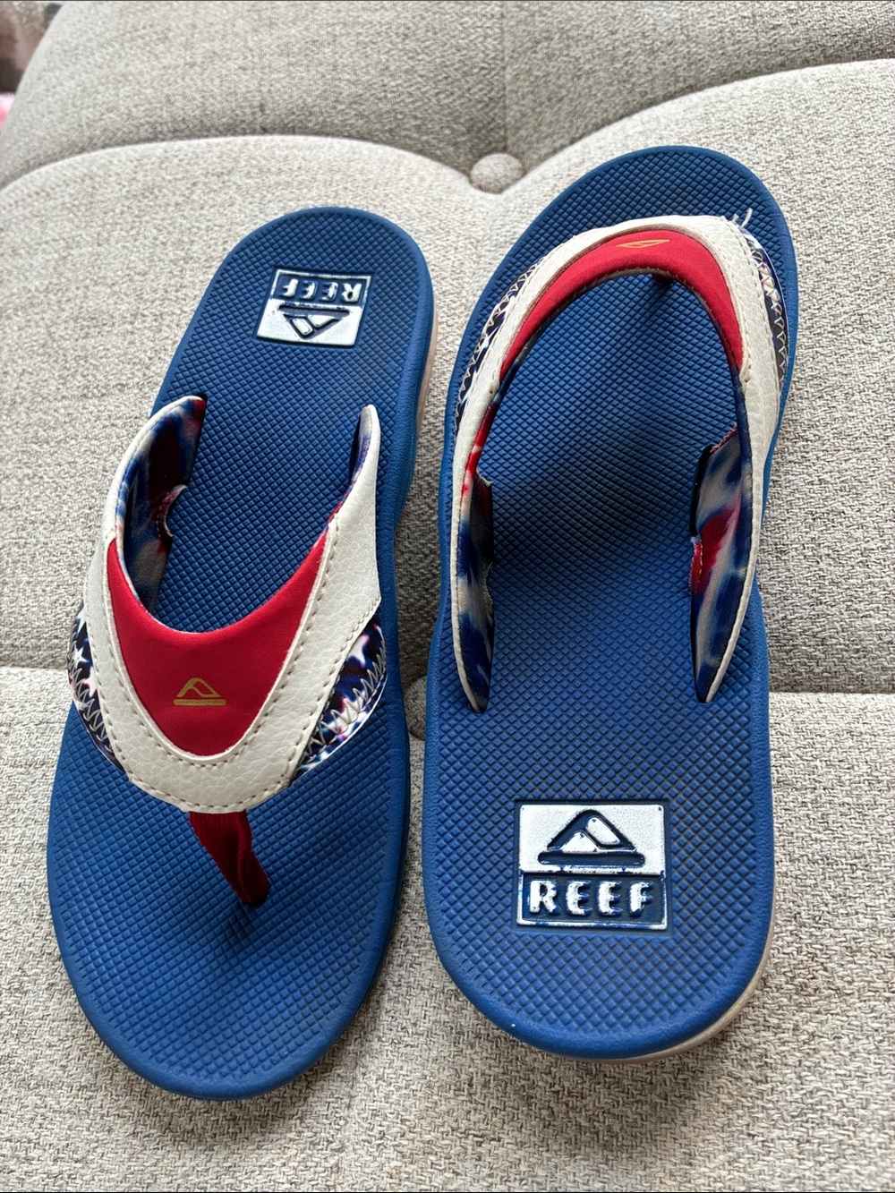 Reef Blue Navy Flip Flops with Red and White Accents